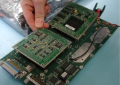 Mobile access router cards being integrated into assembly.